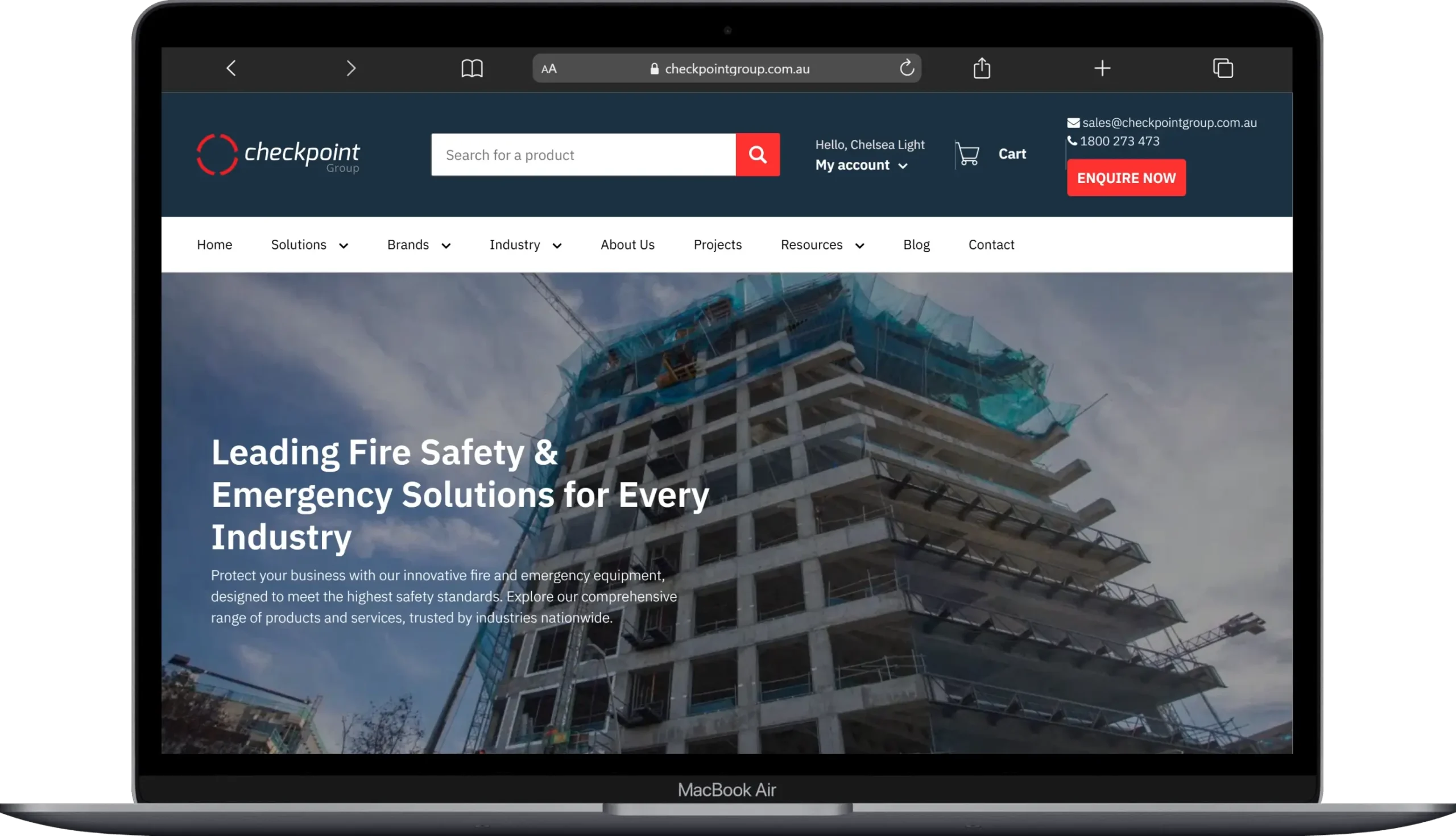 Checkpoint Group fire safety website home page on a laptop showing the main product navigation