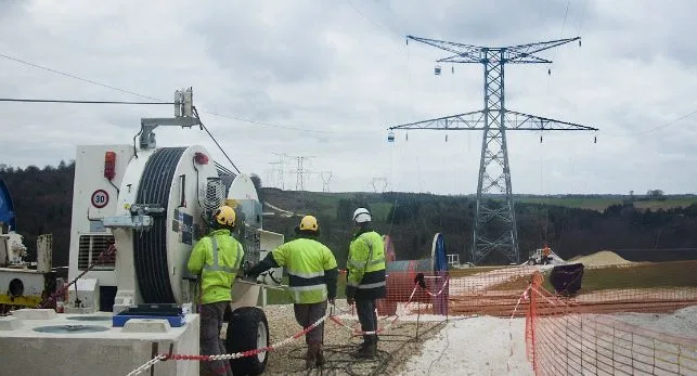 Legend Hire crew installing stringing equipment on a powerline project