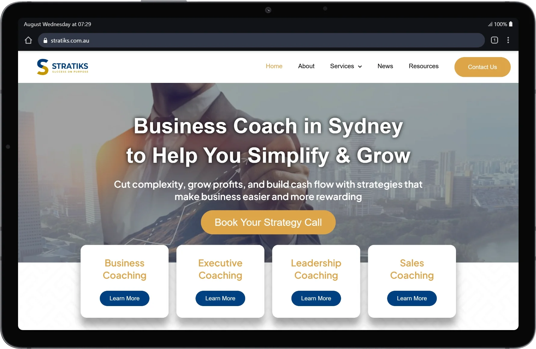 Stratiks website homepage on tablet display
