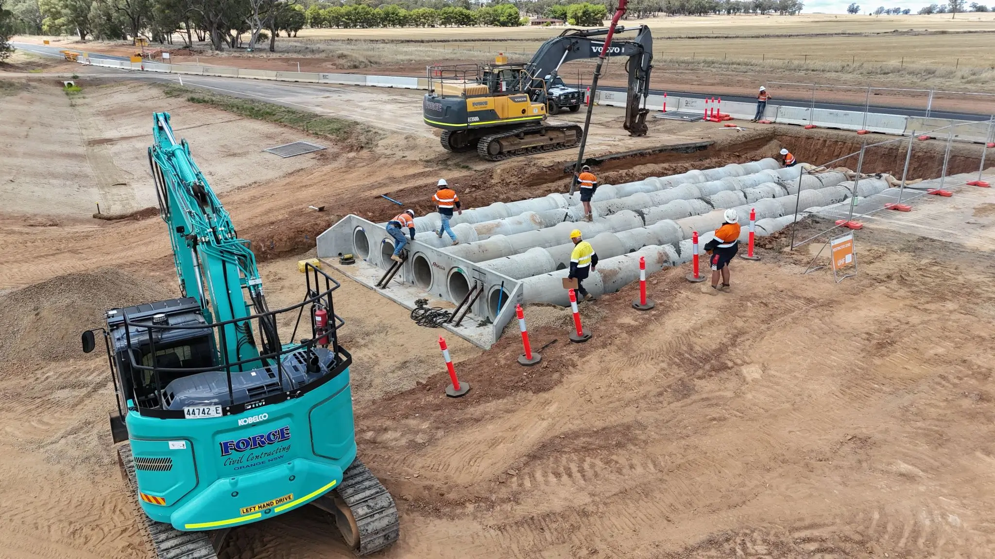 Force Civil crew installing box culverts and drainage pipes on a rural NSW roadside